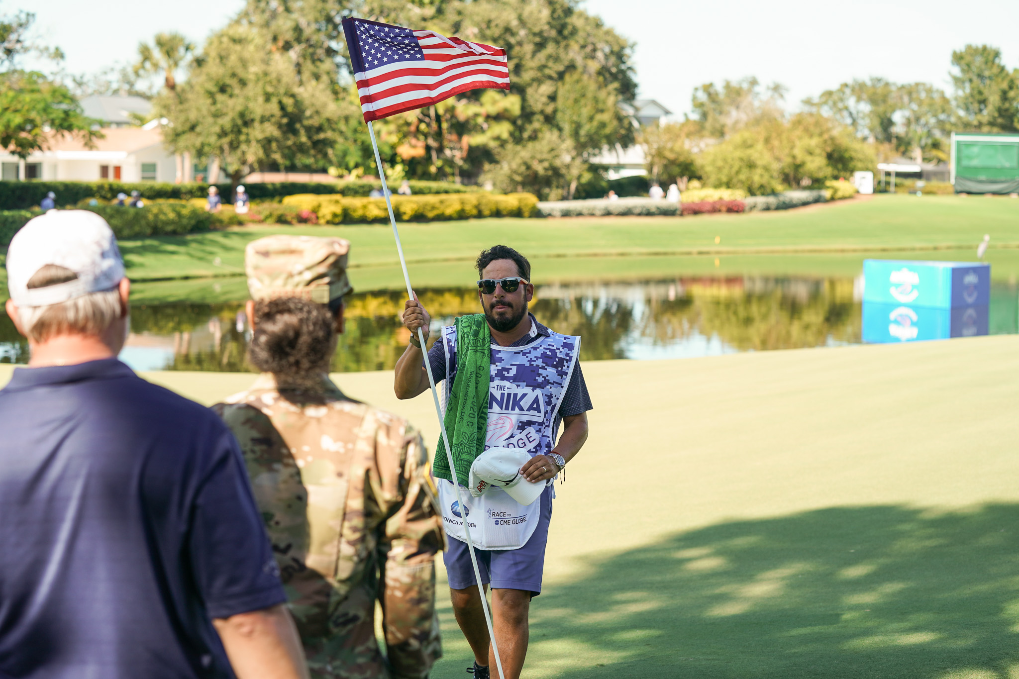 veteran carrying flag