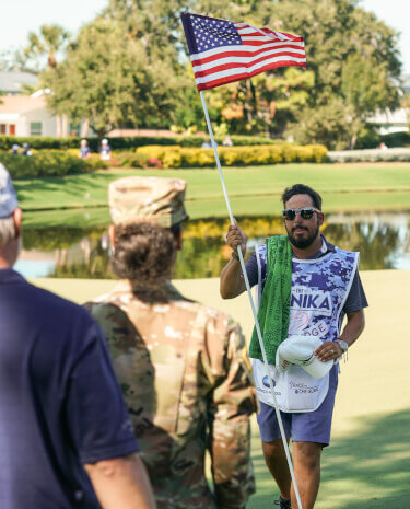 veteran holding a flag