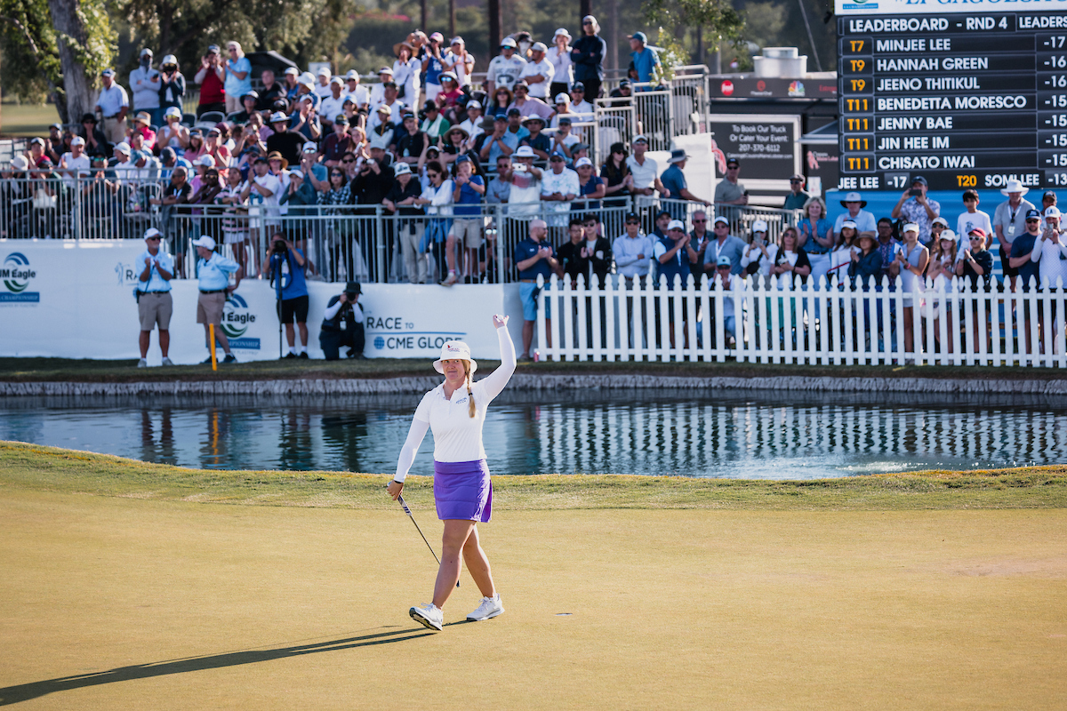 woman player walking on the golf course