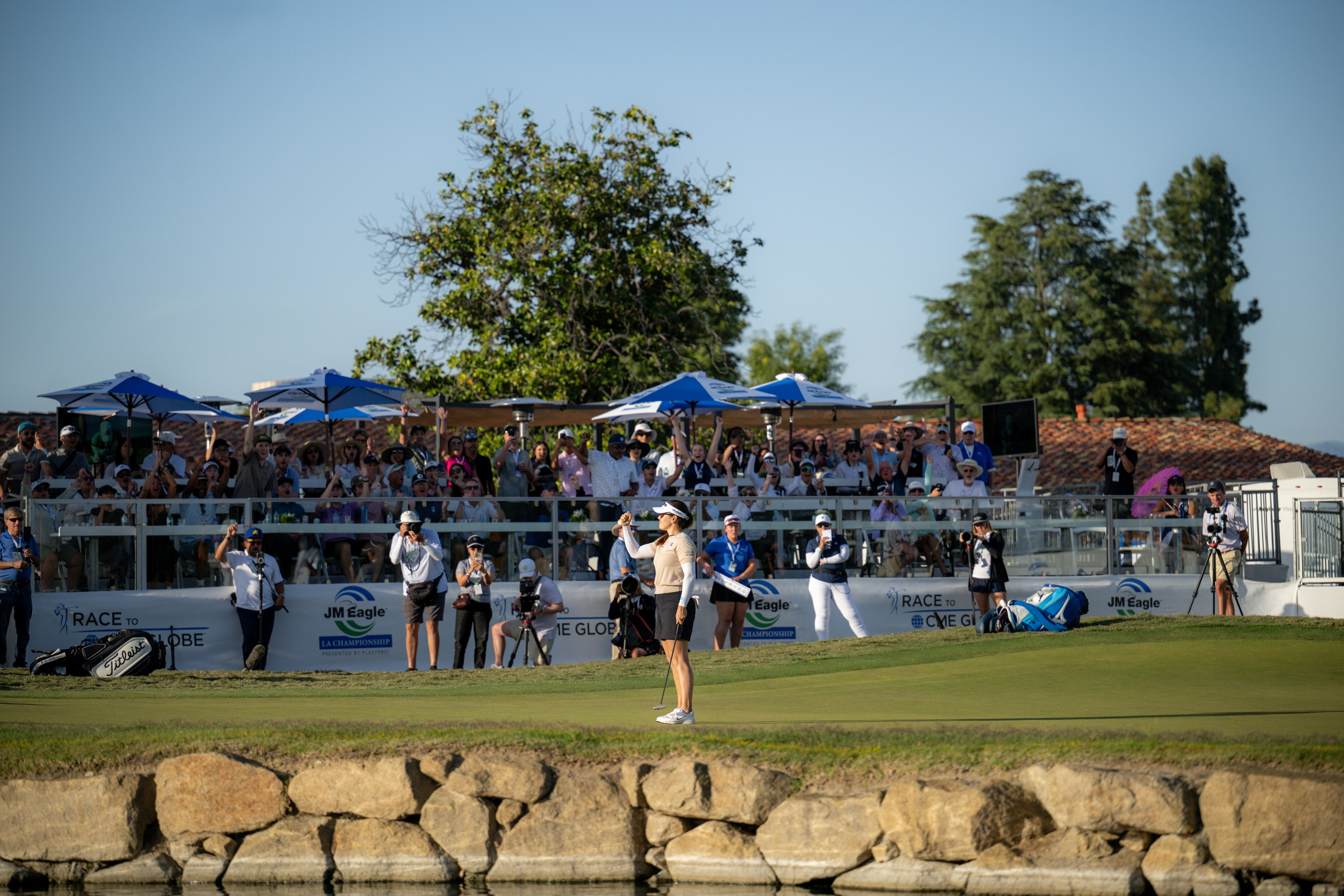 woman player walking on the golf course